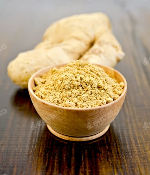 Preview: Ginger powder in a bowl with the root