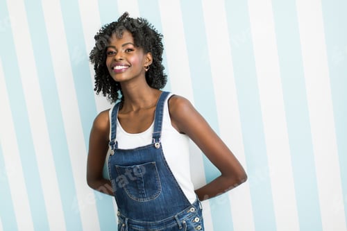 Preview: Woman posing by the wall