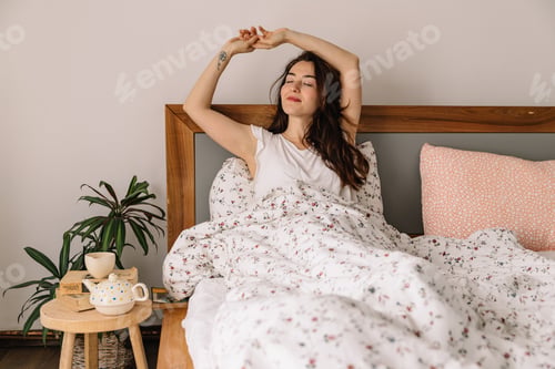 Preview: Woman relaxing at home over the weekend.