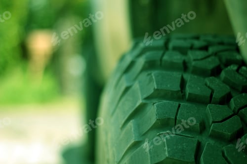 Preview: Big black tire with rough patterns on it - perfect for the background