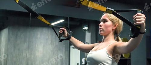 Preview: Gym.Fitness woman working out in the gym, doing exercises for health and beautiful figure.fitness in