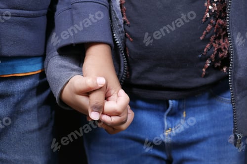 Preview: f child girl holding hand of her bother