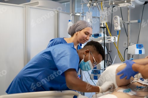 Preview: Medical staff caring for patient in intensive care unit