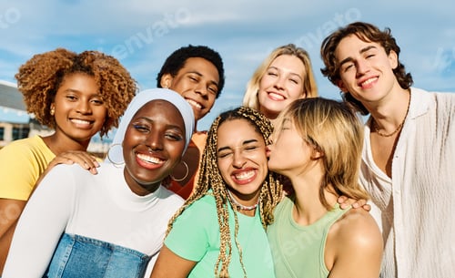 Preview: Young people of multiples cultures embracing and smiling