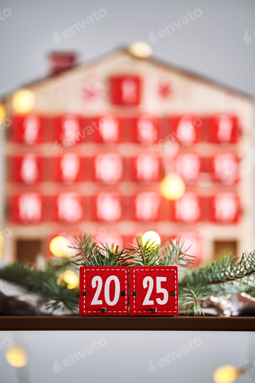 Preview: Christmas Advent calendar in the shape of a house with boxes making up the number 2025.