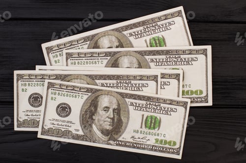 Preview: Four hundred American dollars on dark background