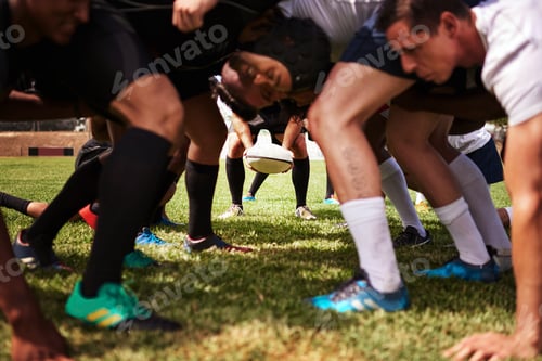 Preview: The clash of the rugby kings. Cropped shot of a group of rugby players in a scrum on the field.