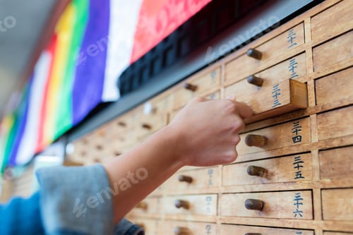 Preview: Tokyo, Japan 22 June 2019: Paper Fortune in a drawer at Sensoji Asakusa Temple