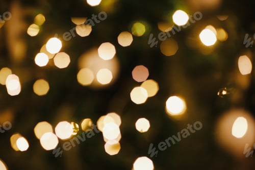 Preview: Golden Christmas lights bokeh. Christmas abstract background, glowing illumination christmas tree