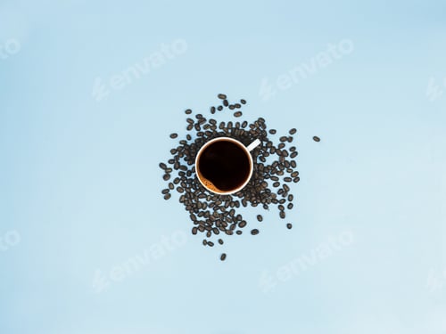 Preview: top view black coffee and coffee beans on blue background