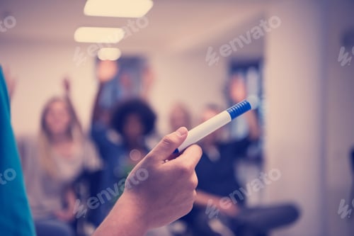 Preview: close up of teacher hand with marker