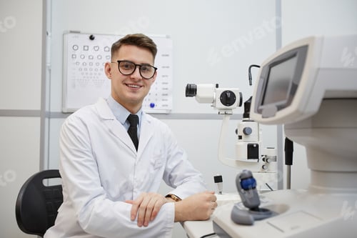 Preview: Male Optometrist Smiling at Camera