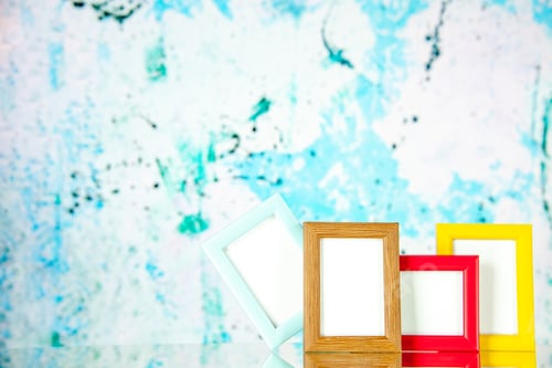 Preview: front view picture frames with colored corners on the light-blue background family present picture