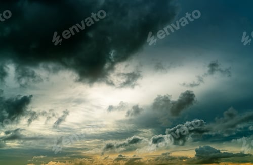 Preview: Sunset sky and gray and golden clouds. Gray sky and fluffy clouds. Thunder and storm sky. Sad