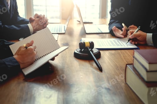 Preview: Businessman and lawyer discuss the contract document. Treaty of the law. Sign a contract business.