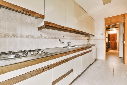 Preview: Interior of modern kitchen with white furniture