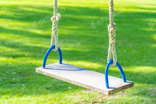 Preview: Empty swing in the garden park
