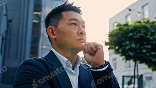 Preview: Dreaming alone thinking pensive 40s Asian Korean man puzzled confused thoughtful decision problem