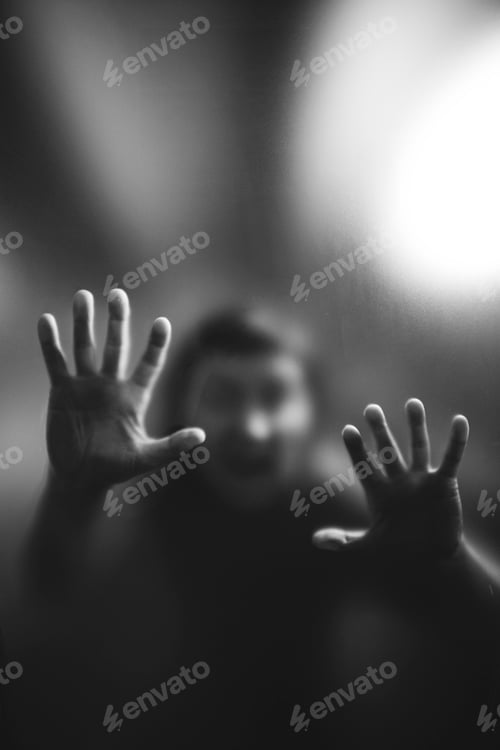 Preview: Scary picture of hands behind glass, horror ghost behind door, Halloween concept