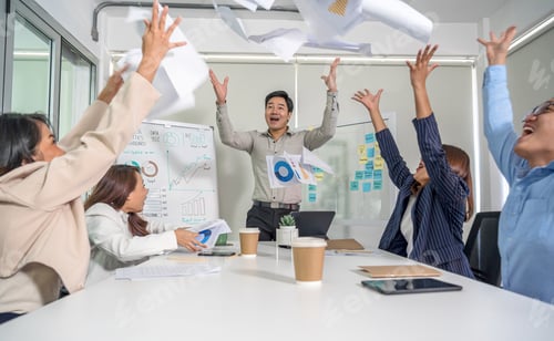 Preview: Group Of Asian Business people throwing paper document together with happiness action