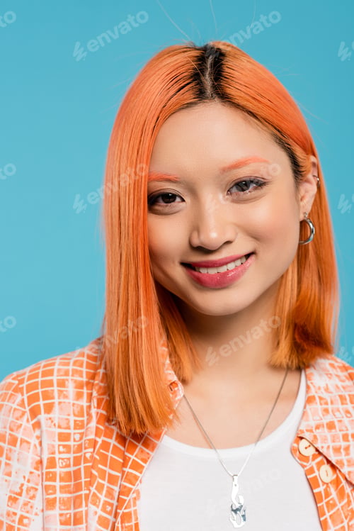 Preview: portrait, young asian woman with short and dyed hair, natural makeup and hoop earrings looking at