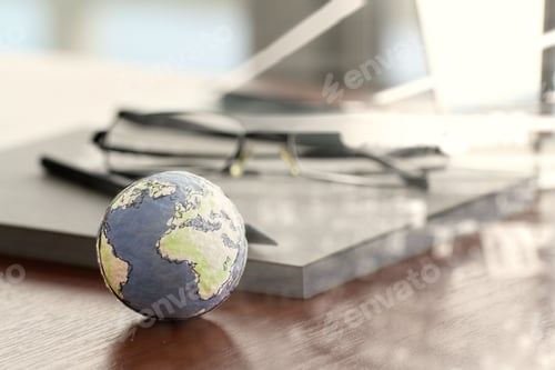 Preview: Double Exposure Of Hand Drawn Texture Globe On Wood Table Near Note Book And Glasses