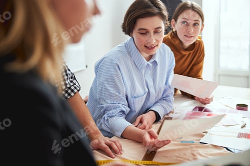 Preview: Admiring the drawings of colleagues while working on design