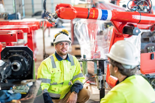 Preview: Engineer working with hardware robotic arm in a workshop Industry check robot programming .
