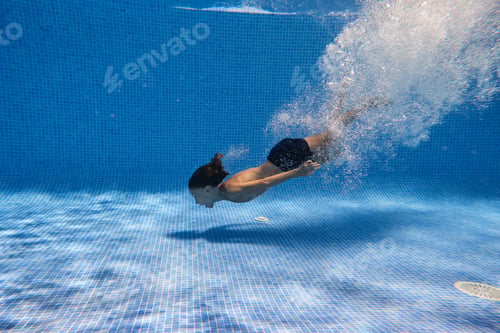 Preview: Carefree boy swimming in pool
