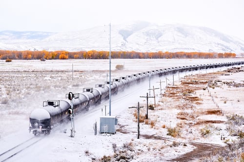 Preview: Train transporting tank cars. Season changing autumn to winter.