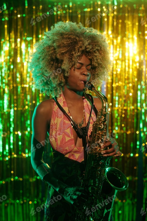 Preview: Playing Saxophone in Front of Golden Sequined Backdrop