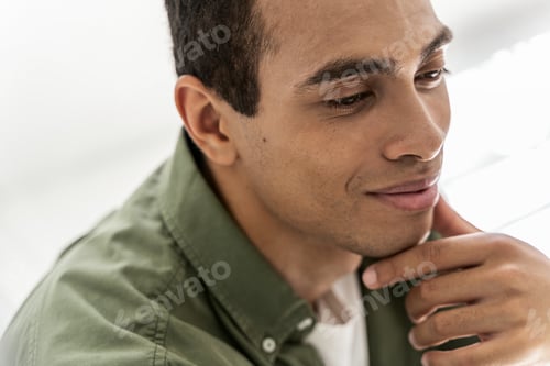 Preview: Handsome young man enjoying his pleasant memories