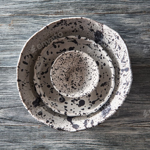 Preview: Clay handcraft empty gray bowls, covered with glazed a gray wooden background with copy space. Flat