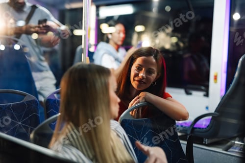 Preview: Two friends talking on a night bus ride home