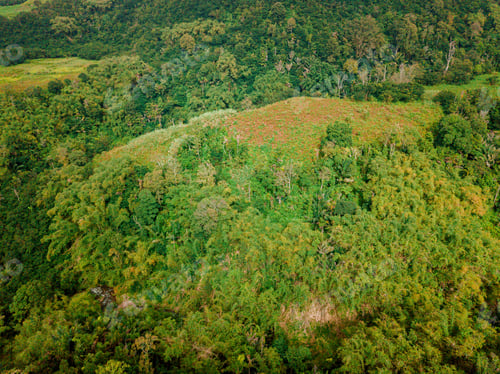 Preview: Aerial drone view of green hill near Mount Sinabung at Berastagi in North Sumatra, Indonesia.