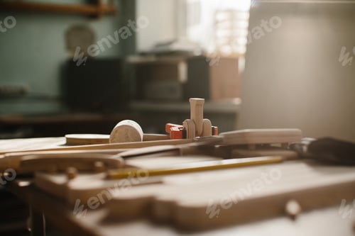 Preview: Carpenter's table close-up. Furniture details and carpenter's tool, selective focus.