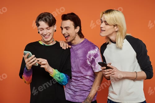 Preview: Queer friends laugh together on orange background