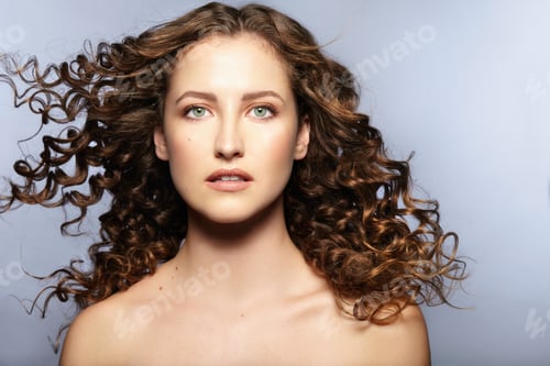 Preview: Female model looking at camera