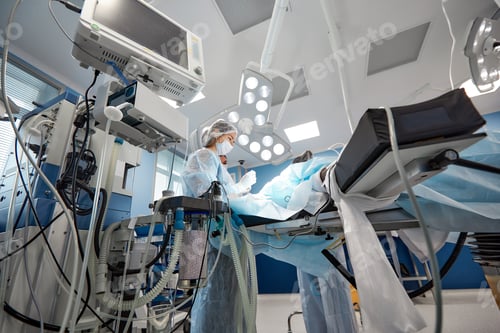 Preview: surgeon keeping track of vital functions of the body during cardiac surgery. Surgeon looking at