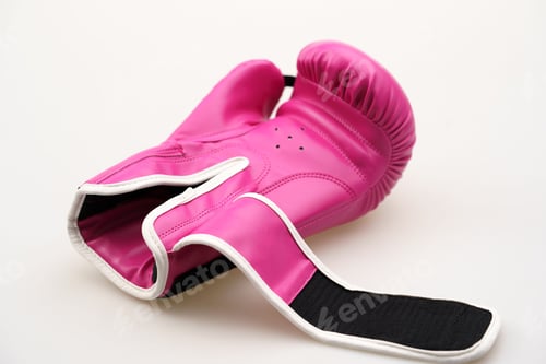 Preview: Closeup shot of pink boxing gloves isolated on a white background