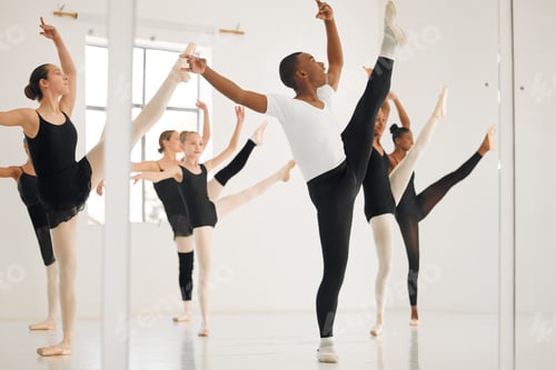 Preview: Shot of a group of ballet dancers practicing a routine in a dance studio