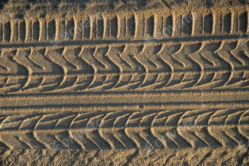 Preview: Tire tracks in beach sand