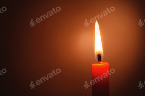 Preview: Wax candle burning in darkness, closeup