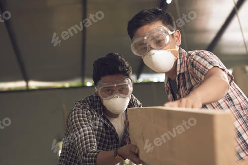 Craftsmen Working with Wood in Workshop Setting