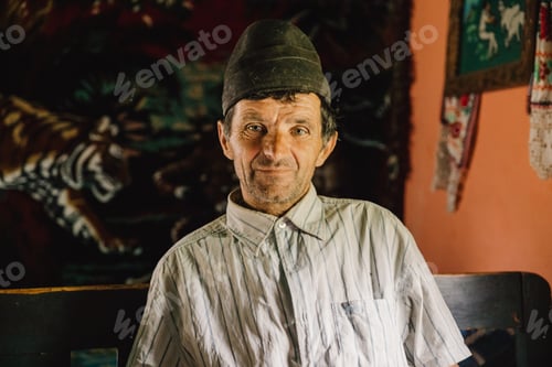 Preview: Senior man in his countryside house from a remote village in Romania.
