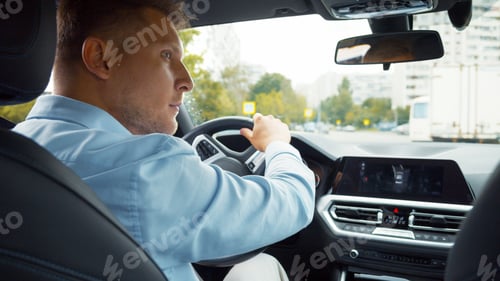 Preview: Young man in the car