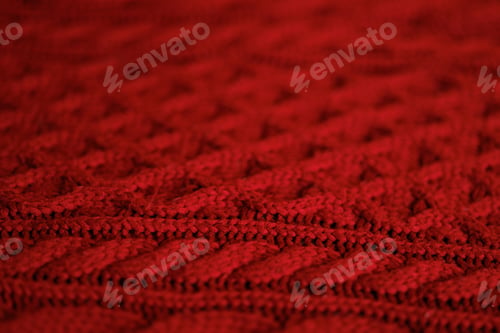 Preview: A close up of a red knit sweater