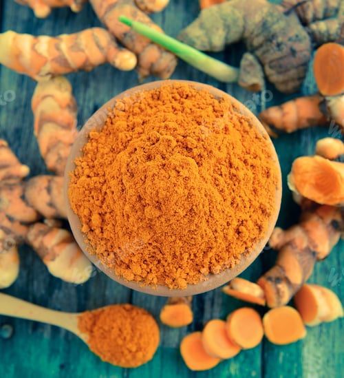 Preview: turmeric roots in the basket on wooden table