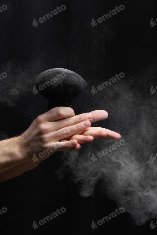 Preview: barber holding a brush for powder