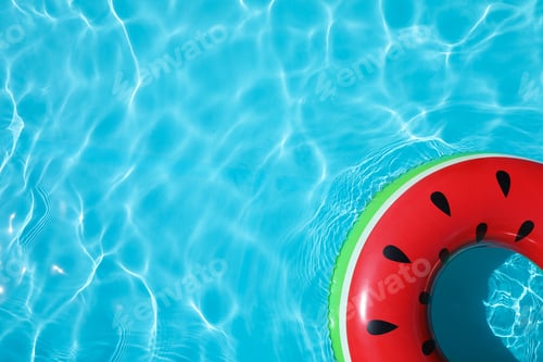 Preview: Inflatable ring floating in swimming pool on sunny day, top view with space for text